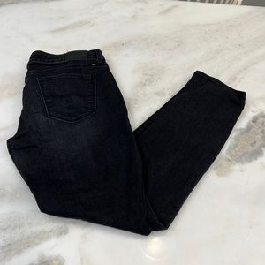 Black Lucky Brand skinny jeans. Size 10. Worn once. Tears in knees.